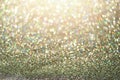 Colorful glitter background with lights, bokeh. Shiny festive greeting card. New year and Christmas concept. Sparkling texture Royalty Free Stock Photo