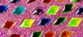 Colorful glitter and multi coloured crystals pattern, array. Simple multi colored gems rows, light glamour cute abstract