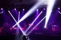Colorful glow bright spotlights with smoke on stage in dark background, stage concert and music festival show concept Royalty Free Stock Photo