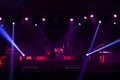 Colorful glow bright spotlights with smoke on stage in dark background, stage concert and music festival show concept Royalty Free Stock Photo