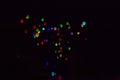 Colorful, glowing Balloons Flying in the Dark Night Sky