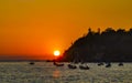 Colorful golden sunset boats wave and beach Puerto Escondido Mexico Royalty Free Stock Photo