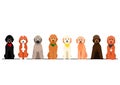 Colorful goldendoodles in a row