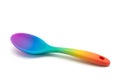 Colorful gradient silicone spoon resting on a plain background Royalty Free Stock Photo