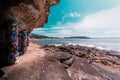 Colorful Graffiti art on pillars supporting the rocks at South Palm Beach, Sydney, Australia