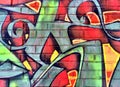 Colorful graffiti detail on a brick wall Royalty Free Stock Photo