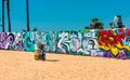 Colorful Graffiti on a wall and barrel at Venice Beach