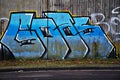 Colorful graffity on gray wall part 3