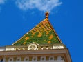 Colorful green, orange and yellow enamel finished steep clay tower roof Royalty Free Stock Photo