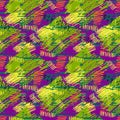 Colorful green, purple, yellow grunge seamless pattern with abstract hand drawn brush strokes and paint splashes. Royalty Free Stock Photo