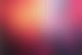 Colorful grid gradient background with tiny square pixels in warm orange pink and purple tones Royalty Free Stock Photo
