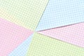 Colorful grid paper pattern with pink, blue, and yellow quadrants for creative background design Royalty Free Stock Photo
