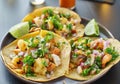 Colorful grilled pineapple and chicken street tacos on plate with lime