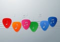 Colorful Guitar Picks with Music Notes Royalty Free Stock Photo