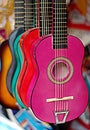 Colorful guitars in musical instruments shop