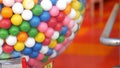 Colorful gumballs in classic vending machine, USA. Multi colored buble gums, coin operated retro dispenser. Chewing gum candies as Royalty Free Stock Photo