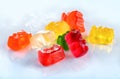 Colorful gummy bears fruit jelly candies close-up on white background