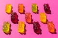 Colorful gummy candy jelly bears, on a pink background. Royalty Free Stock Photo