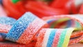 Colorful gummy candy rotating sweets background