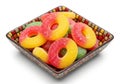 Colorful gummy rings candy in a decorative bowl isolated on white background Royalty Free Stock Photo