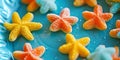 Colorful Gummy Starfish Candies on a Blue Background