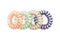 Colorful Hair Band Isolated on White Background with Clipping Path. Closeup of Spiral Four Colorful Rubber Bands for Fashion Royalty Free Stock Photo