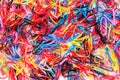 The colorful hair rubber band backgrounds are laid out on a lot of ground, making them an ideal background for designs and copy Royalty Free Stock Photo