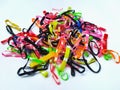 Colorful hair rubber bands on broken white background Royalty Free Stock Photo