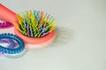 Colorful hairbrush with holders for hair Royalty Free Stock Photo