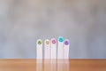 Colorful hand draw happy emotion faces on wooden stick