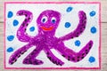 Drawing and crayons: Smiling cute octopus