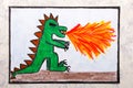 Colorful hand drawing: dragon spitting fire. Fire breathing dragon
