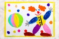 Colorful hand drawing: Friendly smiling clown and ball