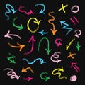 Colorful hand drawn arrows set on black background Royalty Free Stock Photo