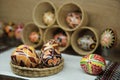 Colorful hand painted Easter Eggs in a wicker bowl. Egg decorating in Slavic culture