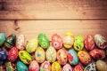 Colorful hand painted Easter eggs on wood. Unique handmade, vintage design.