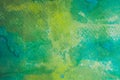 Colorful hand painted watercolor background. Yellow, green and blue watercolor brush strokes. Royalty Free Stock Photo
