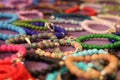 Colorful handmade bracelets made of beads and thread Royalty Free Stock Photo