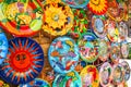 Colorful handmade decorative mexican plates with many patterns o Royalty Free Stock Photo