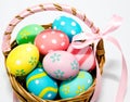 Colorful handmade easter eggs in the basket isolated Royalty Free Stock Photo