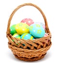 Colorful handmade easter eggs in the basket isolated Royalty Free Stock Photo