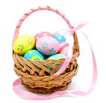 Colorful handmade easter eggs in the basket isolated Royalty Free Stock Photo