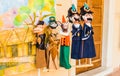 Colorful handmade Italian-style puppets in a children`s theater performance