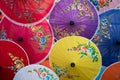 Colorful handmade paper umbrella with flower painting. popular and famous Thai handicraft and souvenir