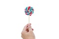 Colorful handmade swirl lollipop isolated on white background. multicolored lollipop, Tasty colorful fruit flavored candy. striped