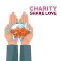 Colorful hands holding in palms a money piggy bank with coins in the form of happy face charity share love