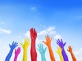 Colorful Hands Raised With Blue Sky Royalty Free Stock Photo