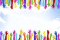 Colorful Hands Raised With Blue Sky Royalty Free Stock Photo