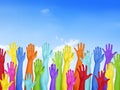 Colorful Hands Raised With Blue Sky Royalty Free Stock Photo