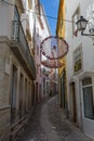 Colorful Hanging Doilies in Public Street in Coimbra, Portugal